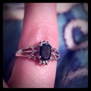 Size 7 silver ring with black gem